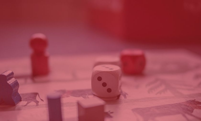 3-Reasons-People-Love-Playing-Asian-Dice-Games-dice-and-small-figurine