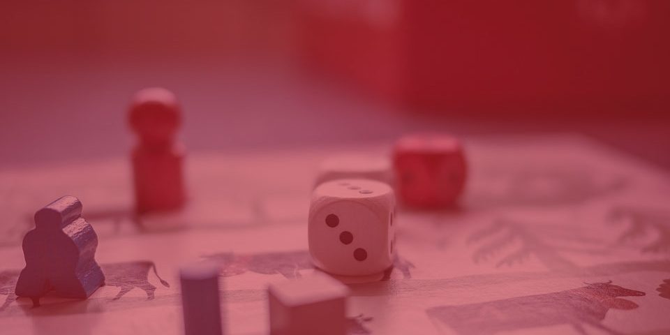 3-Reasons-People-Love-Playing-Asian-Dice-Games-dice-and-small-figurine